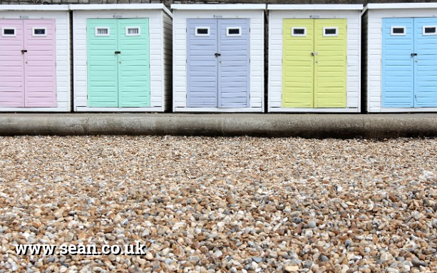 Photo of beach huts in England