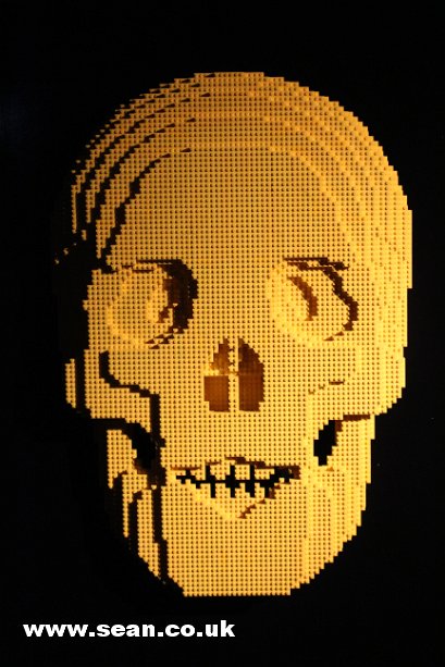 Photo of a yellow Lego skull in London, UK