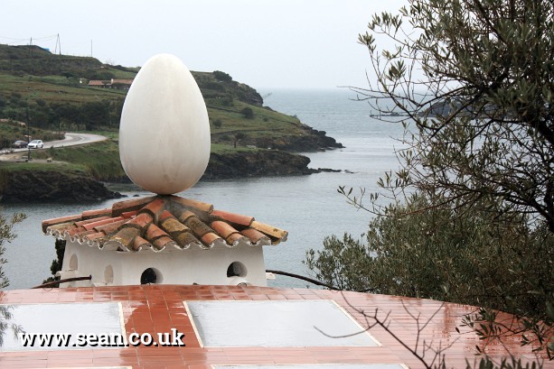 Photo of an egg on top of a building at Dali's house, Port Lligat in Spain