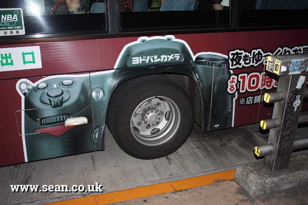Photo of a great camera advert on a bus in Tokyo, Japan