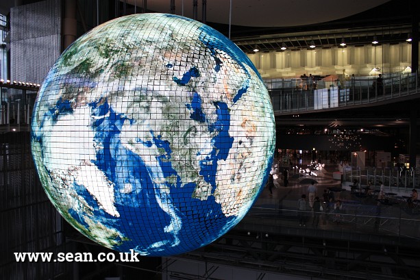 Photo of a world globe, inside the Miraikan in Tokyo, Japan