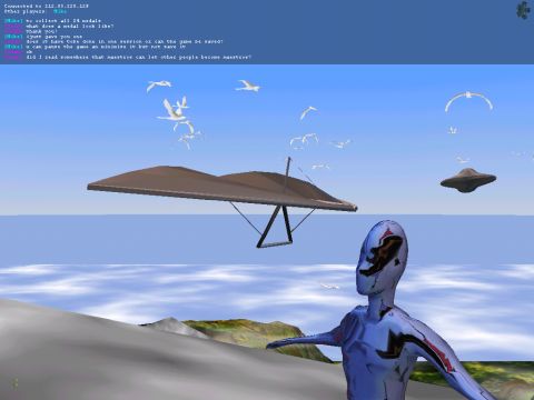Screenshot of Maestro showing statue on mountain, and a hang glider floating by