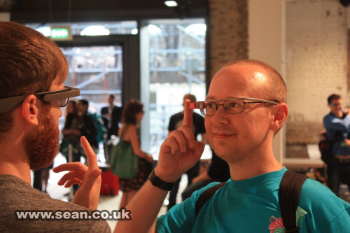 A photo of Sean using Google Glass with a demonstrator