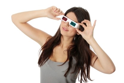Photo of a woman wearing 3D glasses