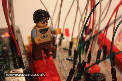 Photo of nerdy Lego man walking around my circuit board