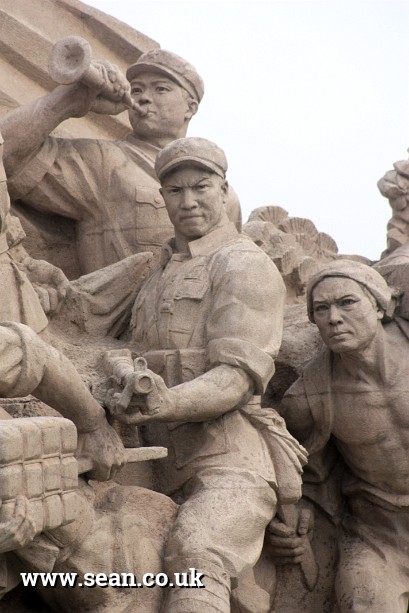 Photo of a revolutionary statue, Tiananmen Square in China