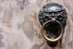 a lion door knocker in the Yu Gardens