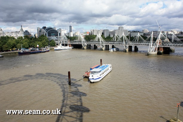 Photo of a shadow of the London Eye on the Thames in London, UK
