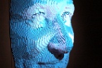a large blue Lego face
