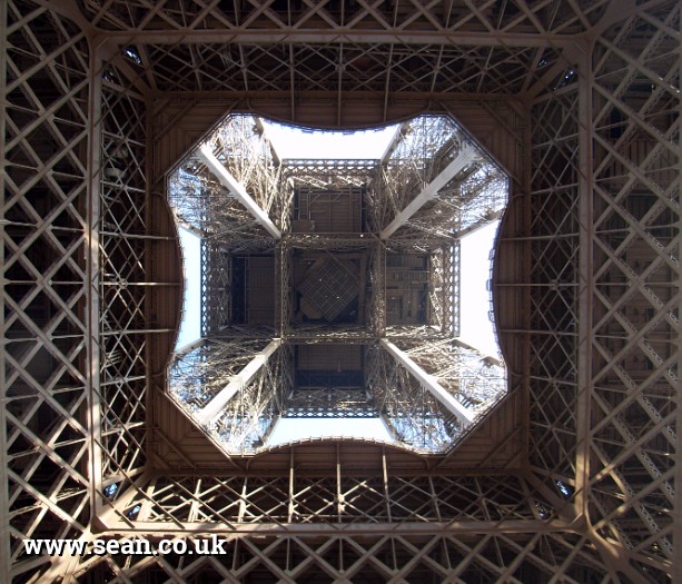 Photo of the underneath of the Eiffel Tower in Paris, France