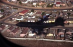 the shadow of a plane landing in Cape Town