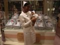 FAO Schwarz: A nurse in the baby doll adoption clinic