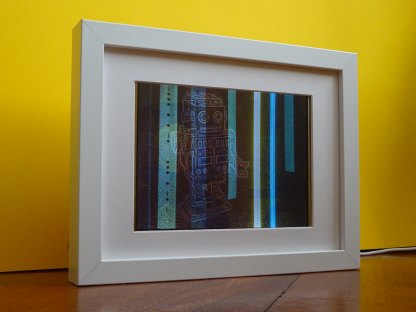 Photo frame containing Raspberry Pi screen showing ArtEvolver running
