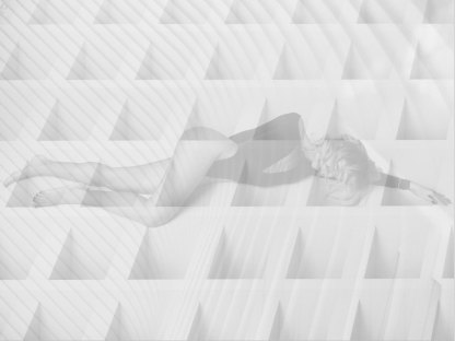 A composite of a woman lying across what looks like a waffle grid, with rounded waves sweeping across the picture