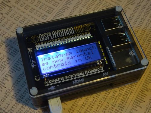 Photo of news headline shown on a Display-O-Tron HAT on the Raspberry Pi